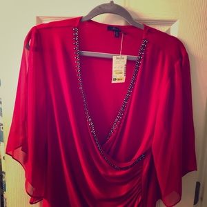 Red sweep top